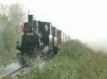 Mit zwei Dampfloks(Vorspann Maffei Lok 200-90)und einem �berf�llten Zug,gehts zur ...