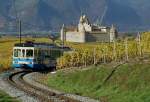 TPC Transports Publics du Chablais Voil�, die Version ohne den bildbeherrschenden Fahrleitungsmasten:

Der ASD Regionalzug N� 434 von Aigle nach Les Diablerets in den Weinbergen von Aigle, im Hintergrund das Schloss von Aigle. 6. November 2008
