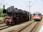 Damals in Emden:
Links die Schnellzugdampflok 01 1066 und rechts der ...