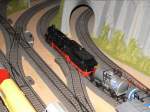 Modellbahn von Christian Maier  Die 59 004 mit einem  Nostalgiezug bei der Ausfahrt aus dem Bahnhof. 