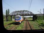 Eine 311D-20 fährt mit einem Güterzug in Richtung Szczakowa. Wir ... Eine 311D-20 fährt mit einem Güterzug in Richtung Szczakowa. Wir ...