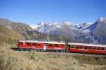 RhB Regionalzug 470 von Tirano nach St.Moritz am 11.10.1999 Einfahrkurve ...
