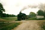 99 (1)784 an einem Maitag 1998 mit dem Personenzug G�hren-Putbus ...