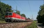 Im der Morgensonne des 11.07.2008 sind die Innsbrucker 1144 215 ...