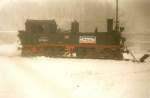 Presnitztalbahn IV-K 99 1568 der Pre�nitztalbahn am 07.Dezember 1996 im verscheiten Bahnhof J�hstadt.Leider st�rt das Werbeschild an der Lok.
