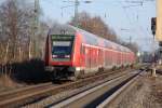 BR 146 mit Zugen Der RE6 nach D�sseldorf geschoben von 146 001-3 bei der Einfahrt in den Bahnhof Rheda-Wiedenbr�ck am sp�ten Nachmittag des 27.12.2008. Der komplette Zug hatte mal eine W�sche verdient...