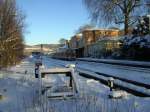Soeben ist der RE 17 aus Hagen bei winterlichem Wetter ...