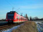 424 003 zwischen Winninghausen ...  Eric Adrian Greulich 07.01.2009