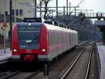 423 191/691 und 423 047/547 warten in Horrem auf die ...