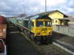 FPL66005 mit einem G�terzug ...  Dariusz Tuczkowski 13.03.2009