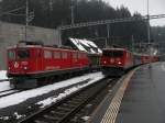 Ge6/6II 701 mit einem Personenzug und Ge6/6II 703 mit einem ...