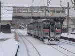 JR Serie 731: Der Zug 731-112 im verschneiten Zenibako zwischen ...