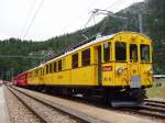 strecke-berninabahn-sm-ti Historische RhB-Triebwagen ABe 4/4 I Nr. 30 und 34 in Doppeltraktion vor Regionalzug, Station Morteratsch, 06. Aug. 2006