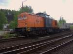 202 271-3 der Bocholter Eisenbahnn rangiert einen leeren Holzzug in ...