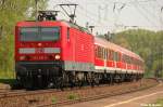 BR 143 mit Zugen Regionalbahn Halle-Eisenach 143 031-3 in Lei�ling (25.04.2009).