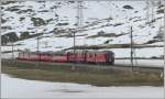 strecke-berninabahn-sm-ti R1643 mit ABe 4/4 II 41 und ? n�hert sich der Station Bernina Lagalb. (06.05.2009)