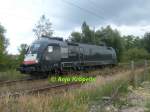 ES64U2026 In Richtung Wismarer Hafen um ihren leeren Holzzug abzuholen ...