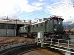 br-1245 21.05.2003, 1245.04 bef�rdert den Bludenzer Klima-Schneepflug 976 311 nach dem 'Abschmieren' aus dem Rundschuppen der Zf Saalfelden, um ihn noch am selben Tag in das TS-Werk Knittelfeld zu bringen.