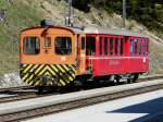 dienst--und-rangierloks RhB - Rangierlok Tm 2/2 20 mit dem Personenwagen B 2305 in Arosa am 07.05.2009