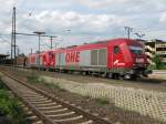 Sonstige OHE 'Panther 270080' und ein anderer fahren am 20.05.'09 mit einem Holz Ganzzug durch Lehrte an Gleis 12