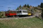 RB Rigi Bahnen BCFhe 2/3 6 und BDhe 2/4 3 fahren am 21.5.09 gemeinsam von Rigi Staffel nach Rigi Kulm.