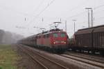 BR 140 mit Zugen 140 857-4 + 140 858-2 mit Kohlezug in Hilden am 05.04.2009