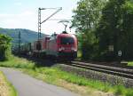 BR 182 182 010-9 der DB Railion mit ihrem Zug bestehend aus Sattelauflieger-Wagen bei KM 198,6 auf der KBS 613. 23.05.2009.