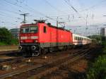 BR 143 mit Zugen 143 244-2 hat ein bissel Gesichts Make-up,zieht ihren D-Zug nach Leipzig.15.05.09.