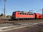 BR 140 mit Zugen 140 506-7 (mit Zusatzscheinwerfern) aus Richtung Braunschweig kommend kurz vor Magdeburg Hbf. Fotografiert am alten Lokschuppen in der Maybachstra�e, 23.05.2009
