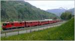 e-loks-ge-4-4-ii RE1244 mit Ge 4/4 II 617 'Ilanz' f�hrt talw�rts durch die Dienststation Fuchsenwinkel. (14.05.2009)