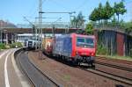 Re 482 482 002-3 mit einem KLV, am 23.5.2009 durch HH-Harburg