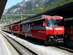 RhB - Ge 4/4 646 vor Persoenzug im Bahnhof von ...