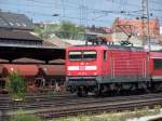 BR 112 112 171-4 mit Puma Wagen bei der Einfahrt in F�rth Hbf. (09.06.2006)