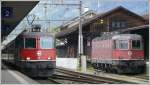 Re 4/4 II 11159 neben Re 6/6 11617 in Landquart. ...