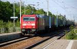 185 310 zieht am 14.05.09 einen LKW-Walter durch Burgkemnitz Richtung ...