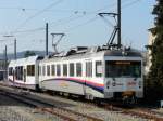 AAR Wynental- und Suhrentalbahn AAR - Triebwagen Be 4/4 27 und Steuerwagen ABt 53 im Bahnhofsareal von Sch�ftland am 09.04.2009