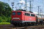 BR 140 mit Zugen ... Und sie f�hrt auch noch: Einzelst�ck mit Railion-Schriftzug und blauem Signet vor dem 'R' statt dem �blichen 'N'. 140 450-8 vor einem gemischten Kesselwagenzug, Ausfahrt Gremberg-Nord, Richtung S�dbr�cke. (19.05.2009).