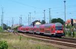 Gegen Mittag kommt hier die RB14 in den Bahnhof von ...