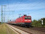 112 151-6 beschleunigt am 17.06.09 die RB 21325 nach Hamburg ...
