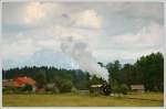 �GEG 77.28 am 1.6.2006 mit einem Fotopersonenzug zwischen Timelkam und ...
