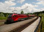 br-1116-vor-personenzugen 1116-215 mit RJ 63 Richtung Wien in Hallwang am 12.6.09.