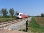 Dieseltriebwagen von Stadler GTW (Arriva) mit Regionalzug 30456 Zuidbroek-Groningen bei ... Dieseltriebwagen von Stadler GTW (Arriva) mit Regionalzug 30456 Zuidbroek-Groningen bei ...