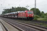 185 252-4 mit einem gemischten G�terzug bei Dedensen/G�mmer.  ...