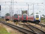 rostock Hier ein Treffen von: ganz rechts: ein Inter Connex nach Leipzig, die anderen drei Z�ge sind Abgestellt. Rostock Hbf. am 27.6.2009.