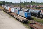 Verkehrsbetriebe Peine-Salzgitter GmbH 185 514-7 mit eienm Containerzug kurz vor der Einfahrt in den Seelzer Rbf.