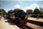 Rugensche Baderbahn - Rasender Roland 99 4652 mit dem Traditionszug im August 2005 in Binz LB.