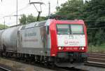 Veolia Die 185-CL 003 der Veolia mit Werbung durchf�hrt K�ln West am 04.07.2009