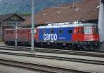 ae-6-6--ae-610 Die klassischen Gotthardloks: Re 620 051-3 Arlesheim cargo und Ae 6/6 11424 Neuch�tel stehen neben dem Depot in Erstfeld, 05. Juli 2009