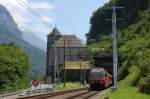 re-460-mit-zugen Re 460 012 am 29.06.2009 beim Zollhaus von St. Maurice
