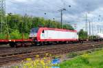 Auslandische Loks ... eingestellt zwischen zwei Schutzwagen in einem G�terzug: CFL 4011. (Gremberg, Ende Mai 2009).